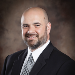 Headshot: Travis Marcum